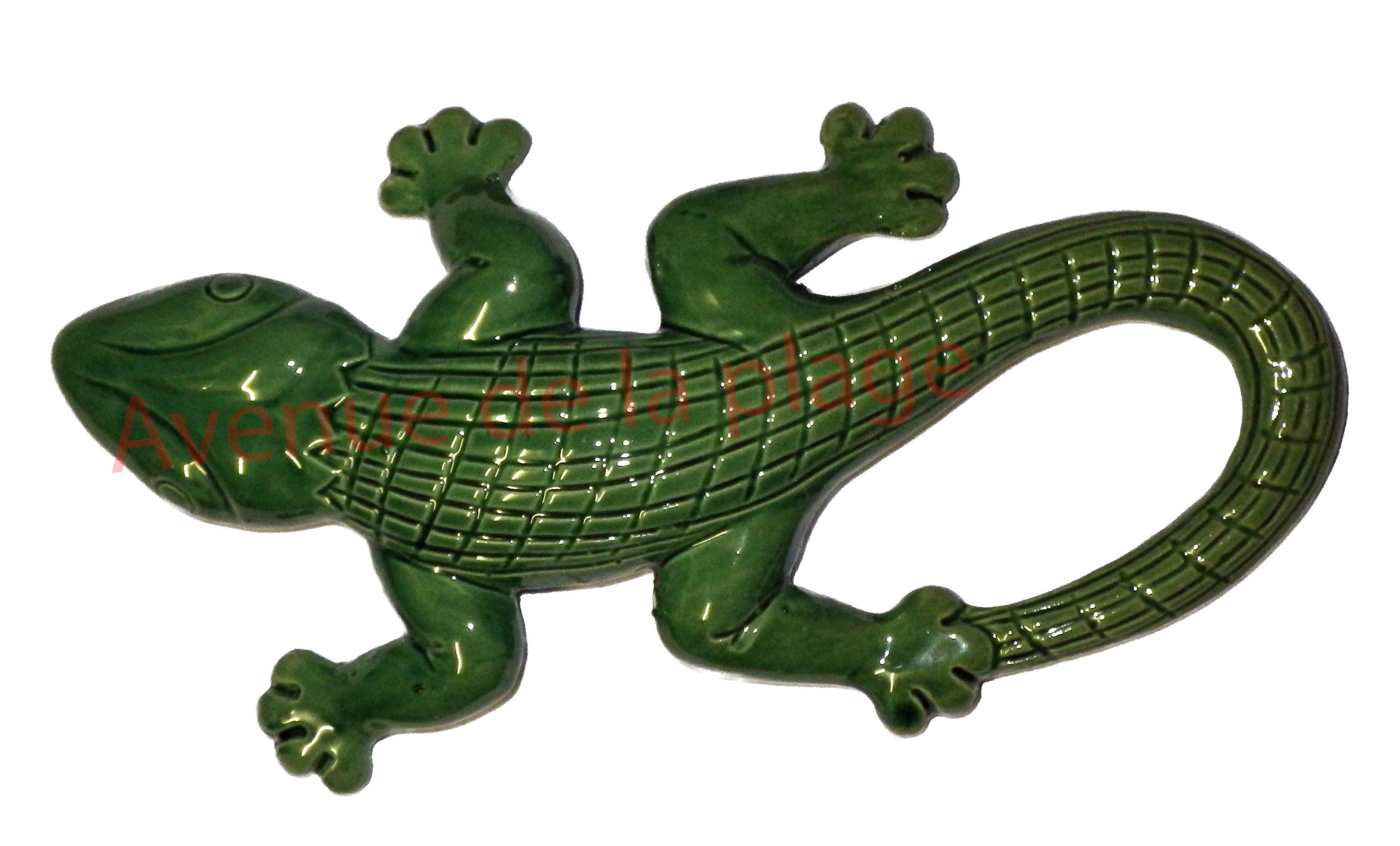 Lézard vert en céramique à accrocher au mur.
