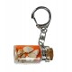 Porte clés bouteille avec sable orange et coquillages