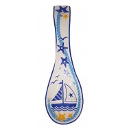 Repose cuillère voilier et étoiles de mer