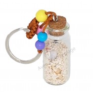 Porte clé bouteille de sable et coquillages