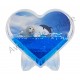 Cadre photo coeur phoque dans l'eau bleue