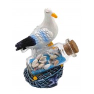 Mouette avec bouteille de sable et coquillages 8 cm