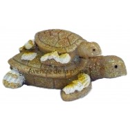 Tortue de mer et son petit façon château de sable