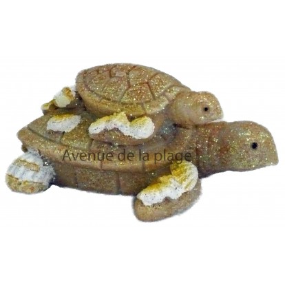 Tortue de mer et son petit façon château de sable