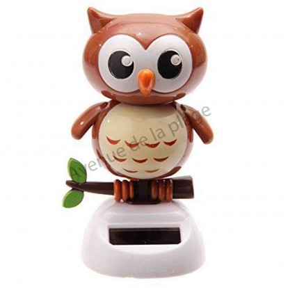 Hibou solaire dansant marron.