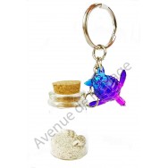 Porte clés bouteille de sable et tortue
