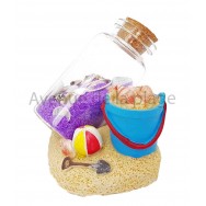 Seau de plage avec bouteille de sable