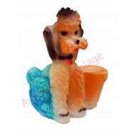 Statuette météo Caniche assis à côté d'un pot de fleur