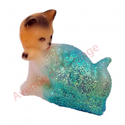 Sujet météo chat faisant sa toilette, bleu par beau temps.