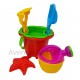 Petit seau de plage rouge et ses accessoires