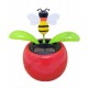 Plante solaire avec abeille qui se balance E